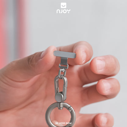 Tag Hợp Kim Mỏng Siêu Nhỏ Gọn Xoay 360 Độ Hỗ Trợ Gắn Cho Dây Đeo Điện Thoại Không Cần Dán